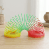 Rainbow Magic Spring Slinky Toy for Kids – Expandable Bouncy Coil Fidget Toy